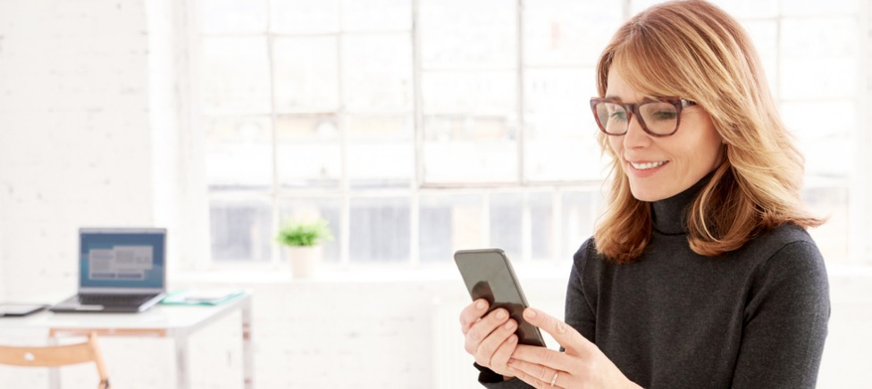 Businesswoman using mobile phone