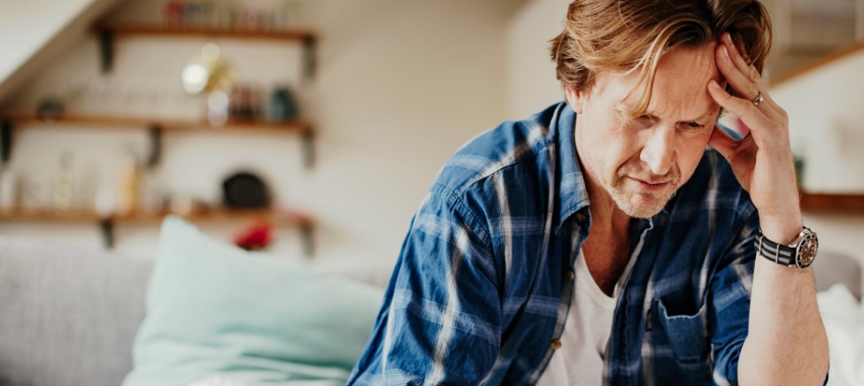 Upset woman sitting on steps