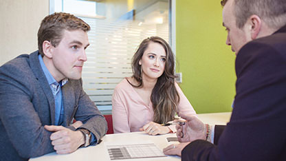 Man and woman meeting relationship manager